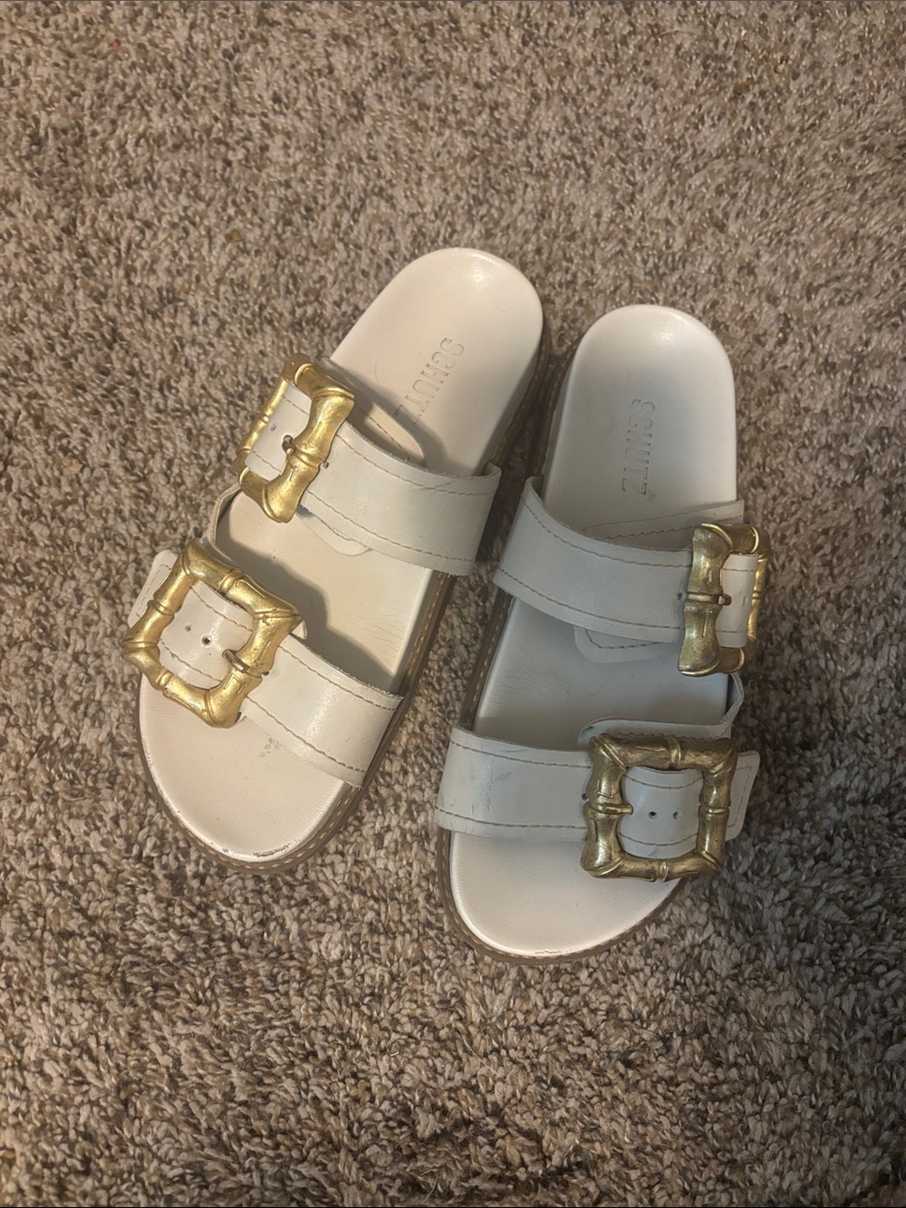 SCHUTZ White Slide Sandals with Gold Buckles